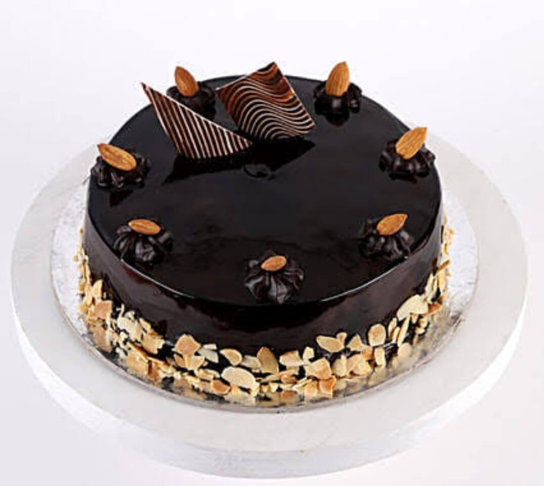 Order Mesmeric Chocolate Almond Cake Eggless 1 Kg Online at Best Price,  Free Delivery|IGP Cakes