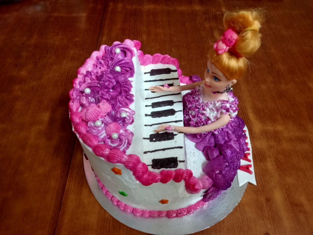 Doll 3D Cake-Doll playing Piano Cake Designs, Images, Price Near Me
