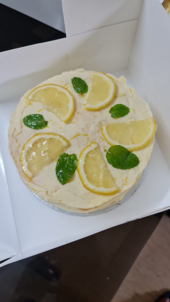 Lemon cake with white chocolate frosting Designs, Images, Price Near Me